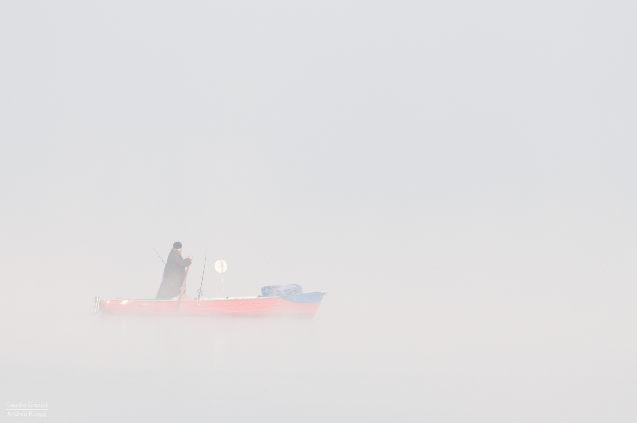 Fisherman in the Morning Mist